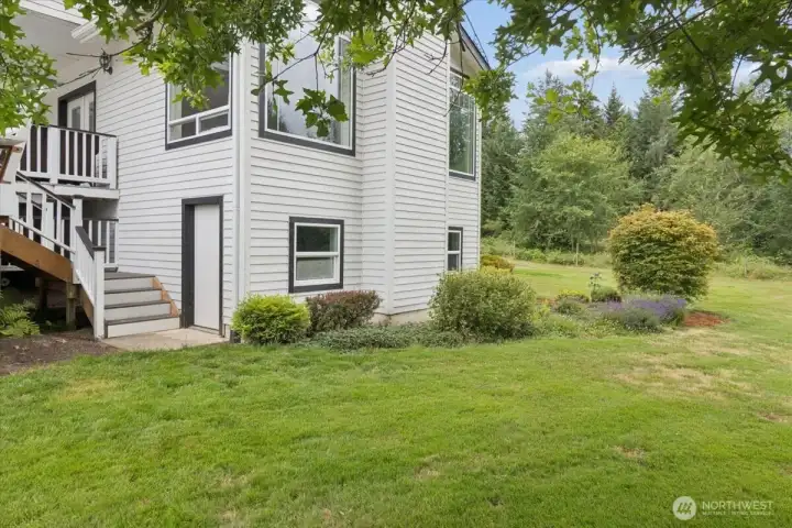 Stairs to bonus room and yard.