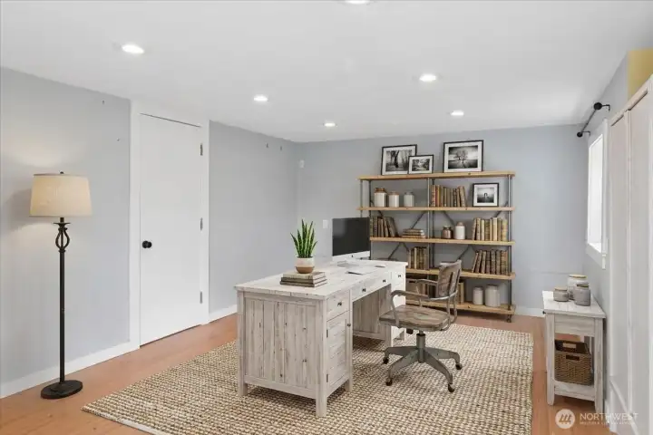 BONUS room in basement. Digitally staged as an office for inspiration.