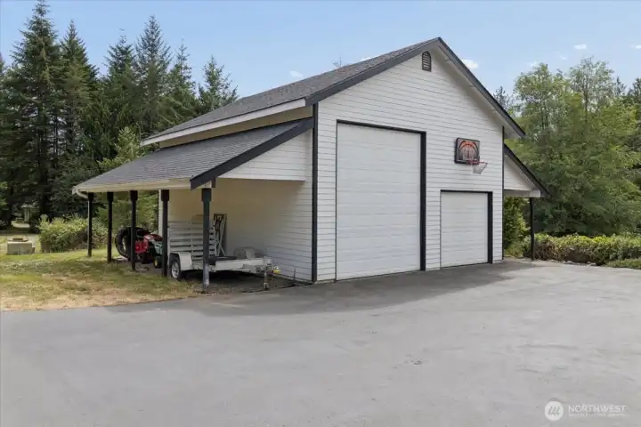 Spacious garage great for RV or all your toys! Carports also provide great covered parking options. NO HOA!