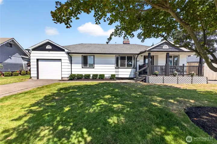Beautiful downtown Puyallup rambler, low maintenance front yard with gorgeous shade tree.