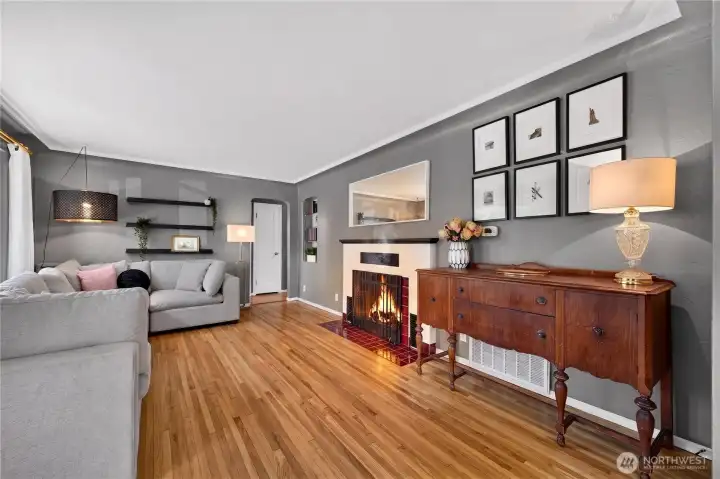 Living Room: Original 1940s niche in the wall adds a charming spot for books or collections. Plenty of room to relax and visit.