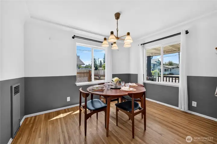 Dining Room: Original wood floors continue into dining area.