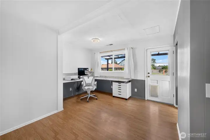 Office: Large open work space just off the kitchen. Great work from home space.