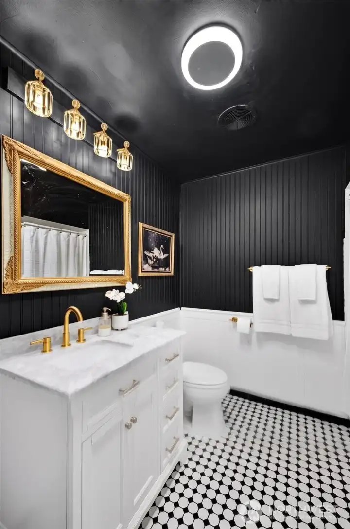 Bathroom: Enjoy the beautiful newer vanity and classic styling of the full bathroom.