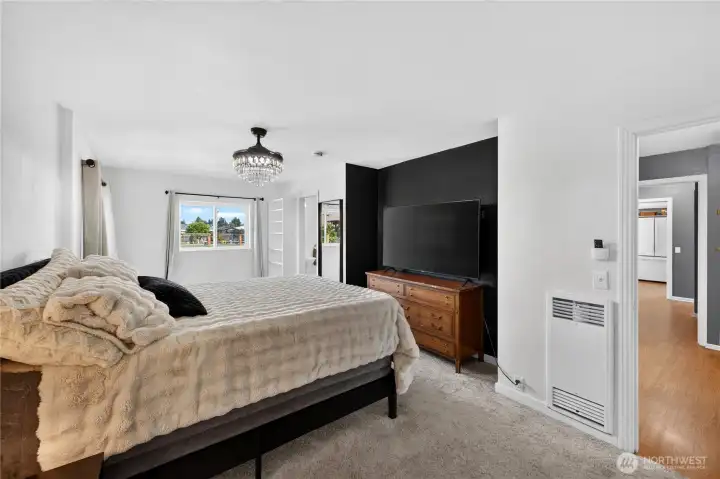 Primary Bedroom: Large primary bedroom with new carpet in 2024.