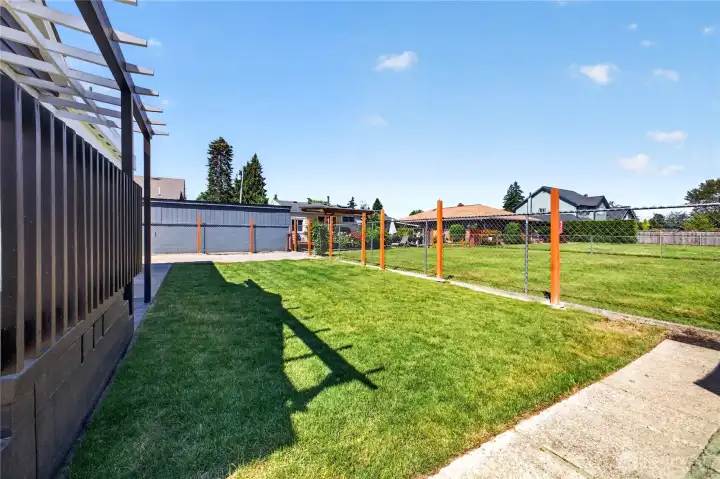 Backyard: Low maintenance lawn.