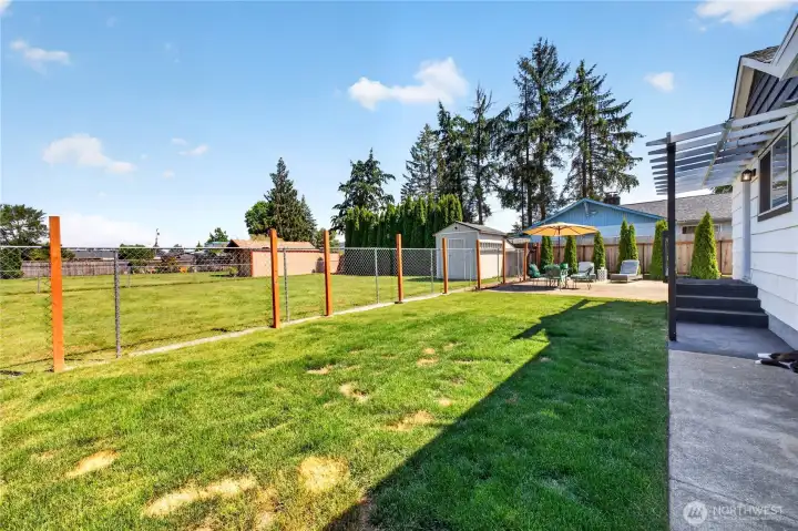 Backyard: Patio space with room to entertain or relax.