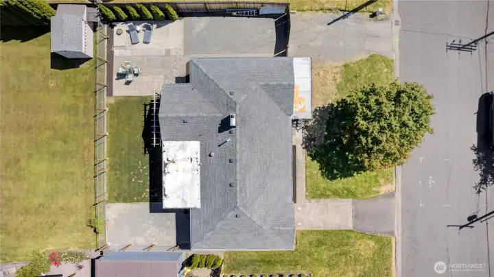 RV parking is shown in the top view. Double gates open for access from the street.