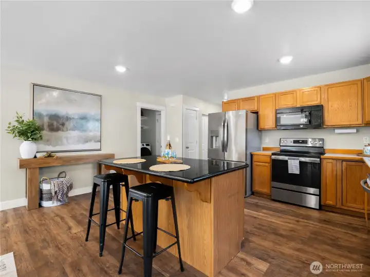 kitchen island provides the perfect spot for meal prep and casual dining, while the conveniently located pantry offers plenty of extra storage within easy reach. kitchen island provides the perfect spot for meal prep and casual dining, while the conveniently located pantry offers plenty of extra storage within easy reach.