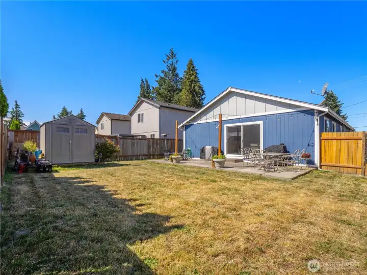 Enjoy a nicely sized backyard that offers plenty of space to relax and entertain without the hassle of high maintenance, plus the convenience of a storage shed for added organization. Enjoy a nicely sized backyard that offers plenty of space to relax and entertain without the hassle of high maintenance, plus the convenience of a storage shed for added organization.