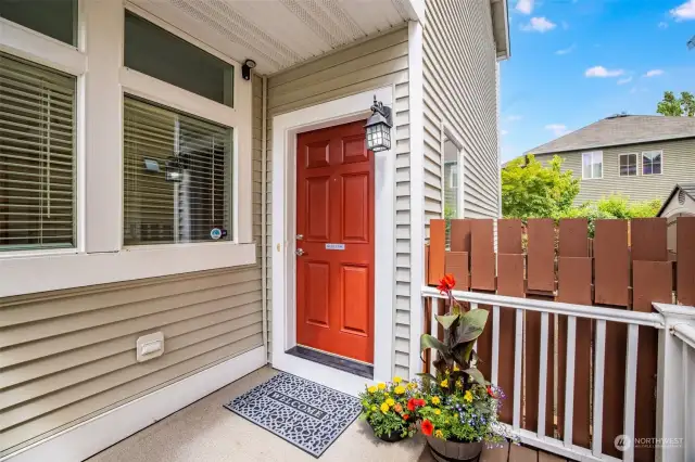 Greet guests on this spacious front porch!