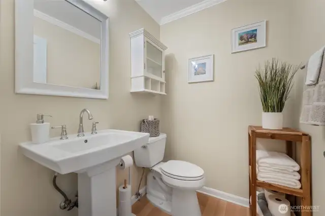 Updated half bath located near entry