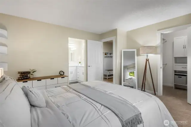 Primary bathroom to your left and walk in closet to your right