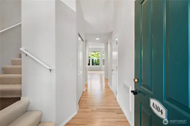 Welcoming foyer with high ceilings for a bright, airy feel right as you walk in