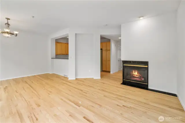 Cozy corner gas fireplace adds warmth and charm to the living space
