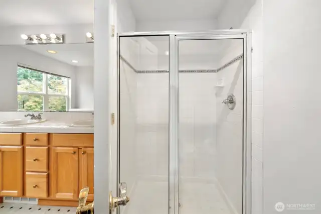 Private en-suite with glass-enclosed shower