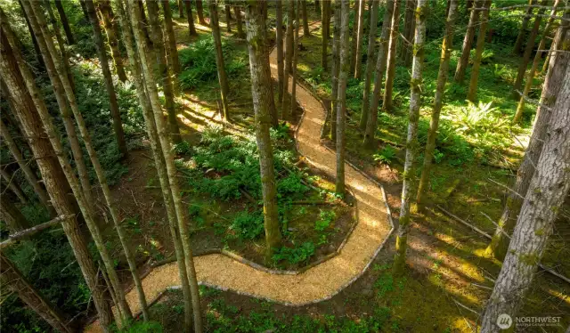 The manicured trails wrap the property and are lined with cedar for easy access.