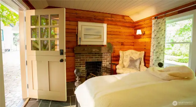 The sleeping cabin has a wood burning fireplace and polished slate floors.