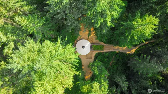 Aerial of the Yurt with living roof at the entry. The deck and entry were built with no fasteners showing.