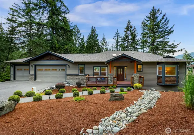 Worry free yard with a 3 car garage and long flat driveway