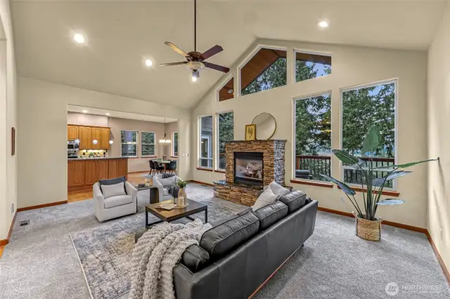 Living area open with vaulted ceilings.
