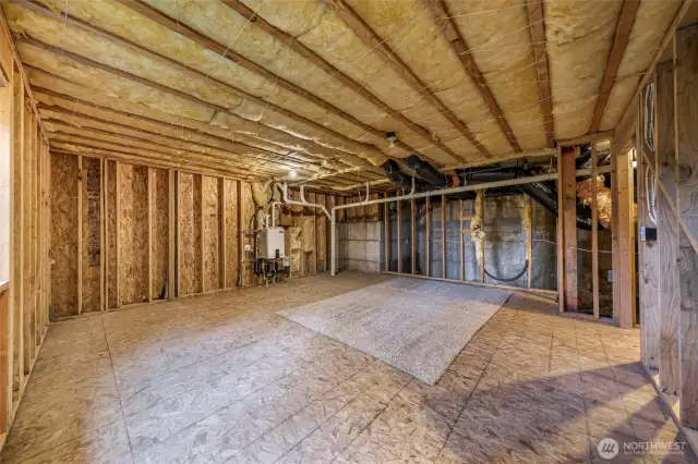 Unfinished third level. Tankless water heater.