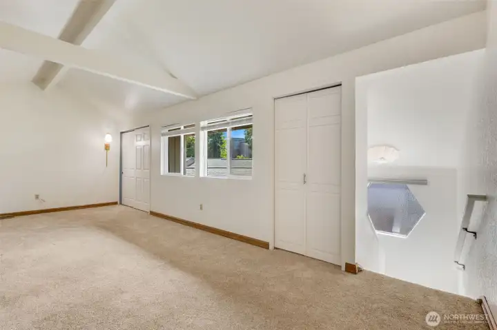 Upstairs loft with plenty of storage for home office or gym??