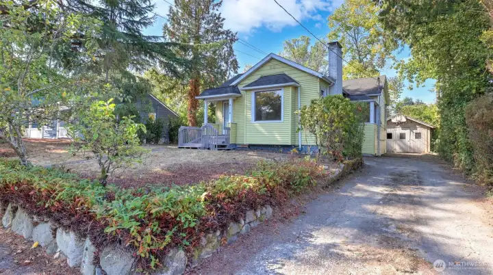 Charming house on a massive 8400 sq ft lot. Long drive leads to detached garage and provides ample off street parking.