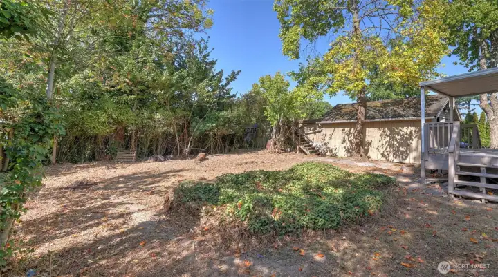 Expansive backyard offers so many possibilities!
