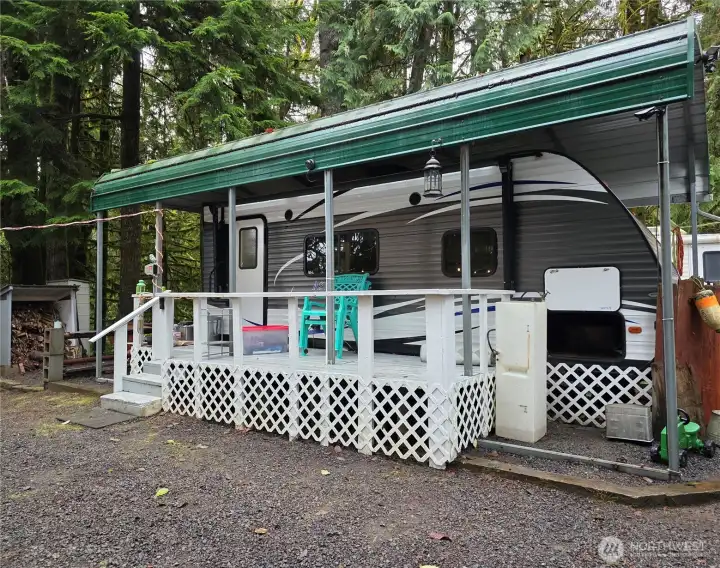 Newer Apen Trail RV with metal cover