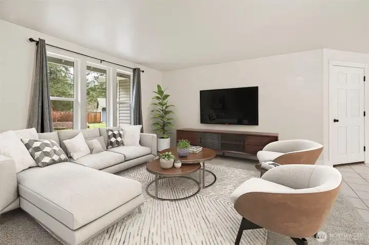 Looks great, ready for your personal touch! Plenty of room for comfy seating and a TV. (Virtual staging)