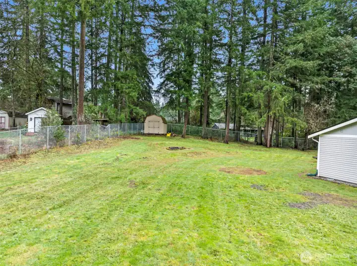The storage shed conveys with the property.