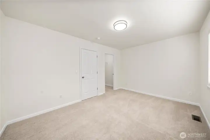 Additional bedroom offers flexibility and comfort.