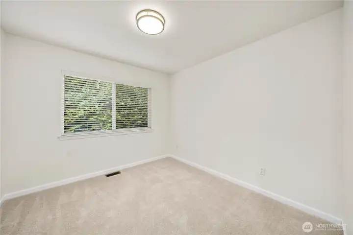 Additional bedroom offers flexibility and comfort.