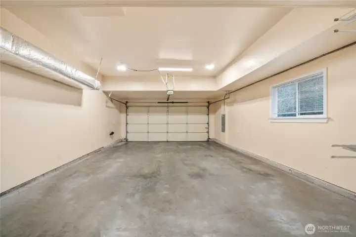 Deep two-car garage with with room for storage.
