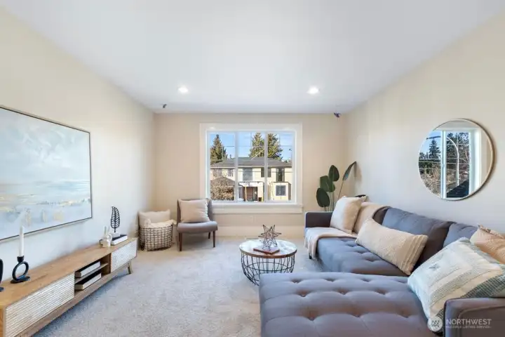 Upper level media /play room gathering space wired for speakers