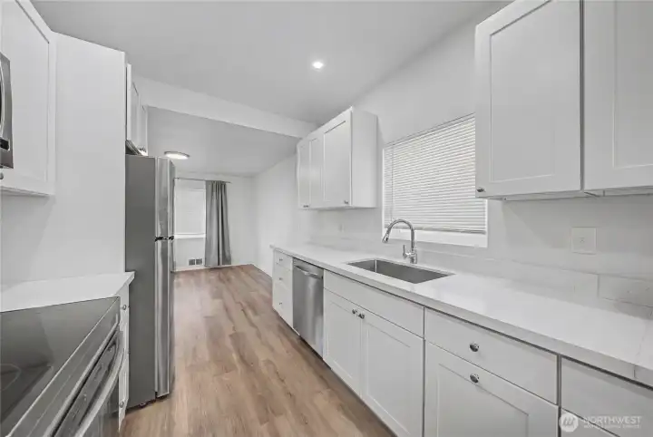 Beautiful, stunning kitchen and countertops. Virtually staged (removed items from counters)