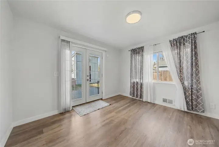 Dining room, virtually staged. Removed furniture