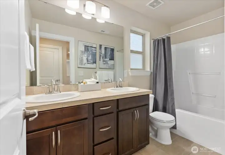 Hall bathroom with double vanity