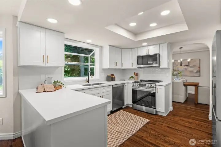 Clean lines, modern finishes, and abundant storage enhance the functionality of this kitchen.