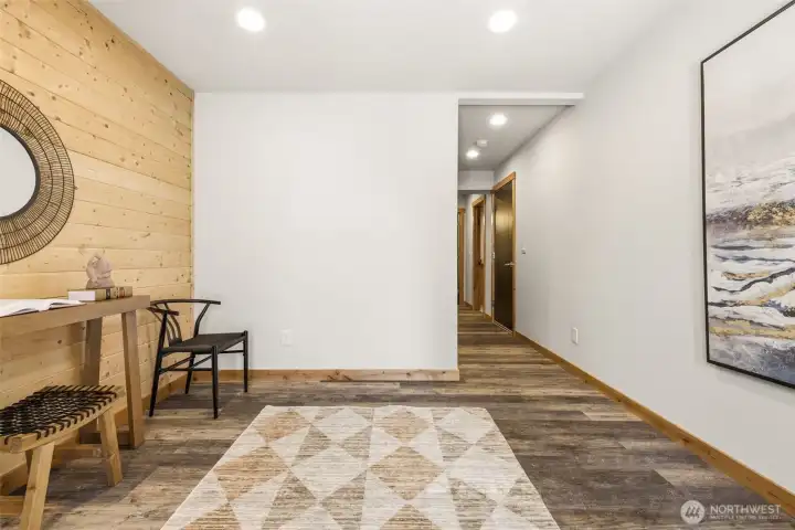 Large entry with hardworking flooring is the perfect landing spot for active gear