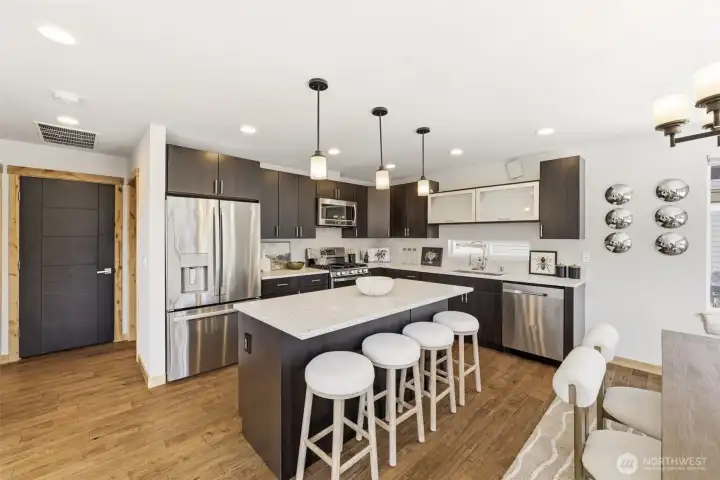 Center island creates additional seating perfect for a big group