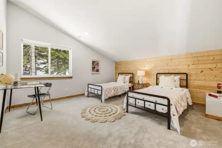 Each with plush carpeting, accent pine walls and woodland or mountain views