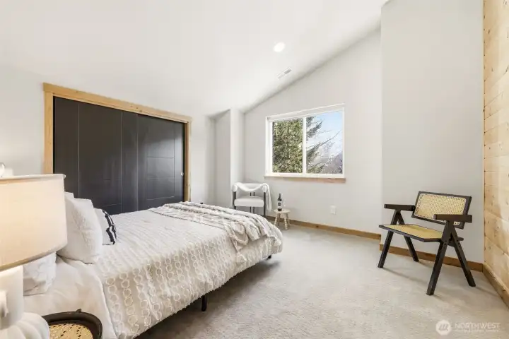 Boasting large closets, plush carpeting and mountain views this bedroom could be the ideal home office