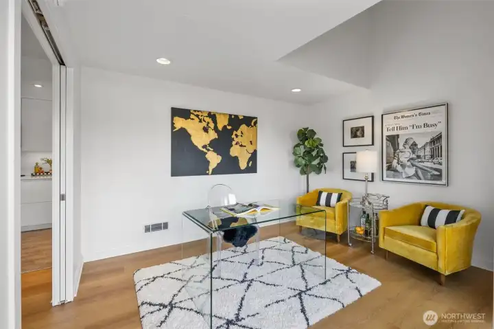 Just off the dining area, the main floor bedroom also makes a great office.