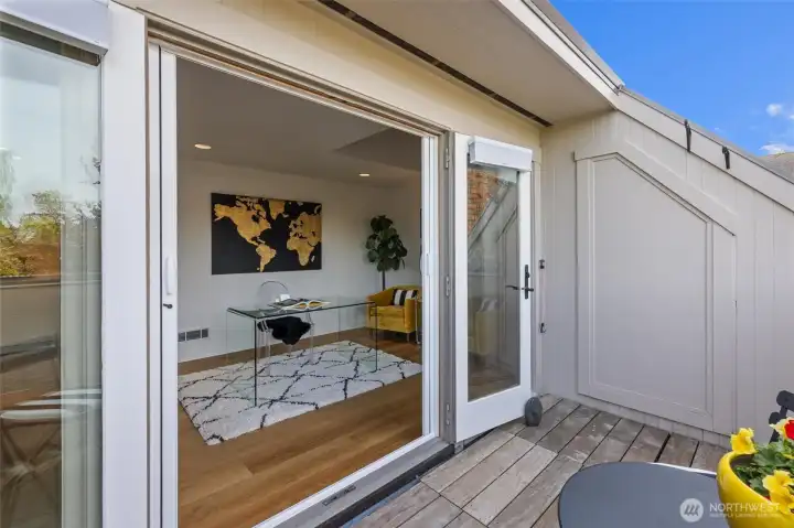 French doors open to the second balcony right off the main-floor bedroom.