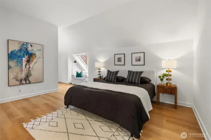 Head upstairs to your spacious primary bedroom with engineered hardwoods.