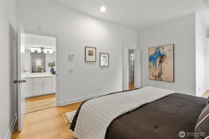 Looking toward the adjacent full bath and walk-in closet.