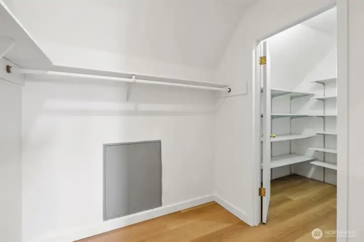 Large walk-in closet with shelving to organize all of your favorite things.