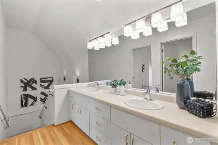 Full upstairs bathroom accessible from both bedrooms.
